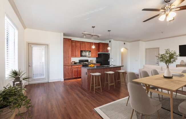 a kitchen and dining area in a 555 waverly unit
