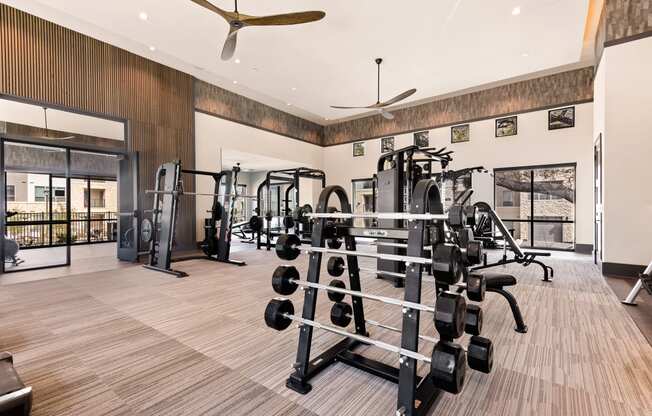 exercise room at ironridge at hill country village apartments