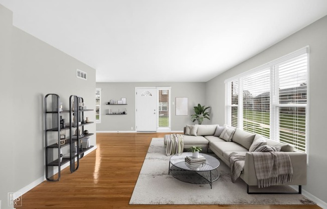 a living room with a couch and a coffee table