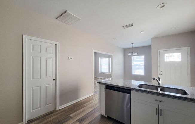 Beautiful 1 Story MOVE IN READY New Construction home in Lake Conroe Village Subdivision. This Gorgeous Open Floor Plan has 2 Bedrooms, 2 Baths. Front door with Glass Insert. Large Kitchen area with Granite counter tops and ample Kitchen Cabinets with S/S