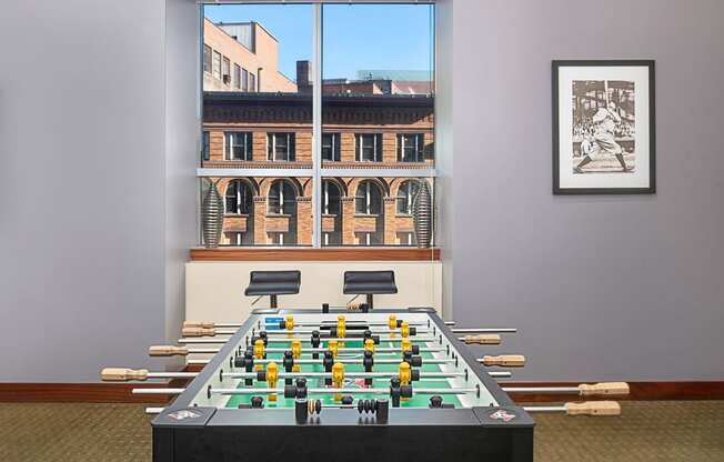 Play a game of foosball in the game room | Hartford 21
