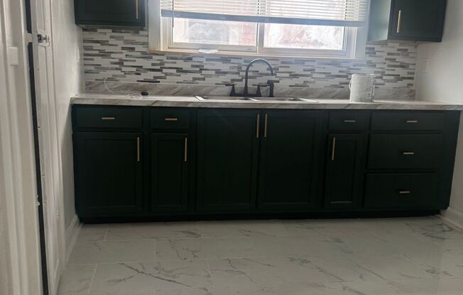 3 bed/1 bath-- WATER INCLUDED/Appliances included- Two Family Flat- UPPER UNIT