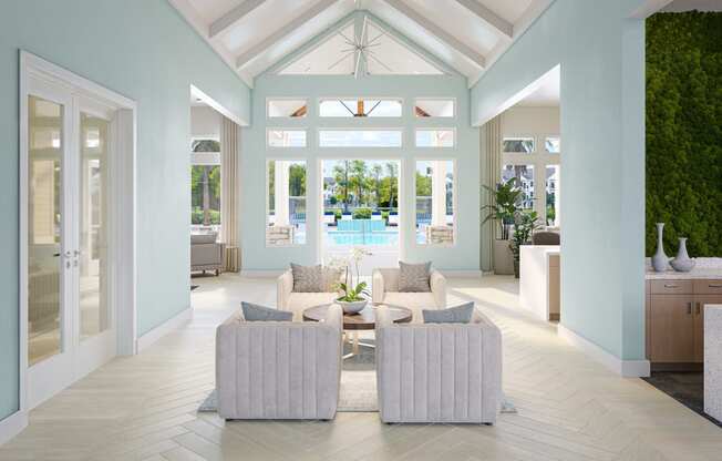 a lounge  with blue walls and white furniture and a pool