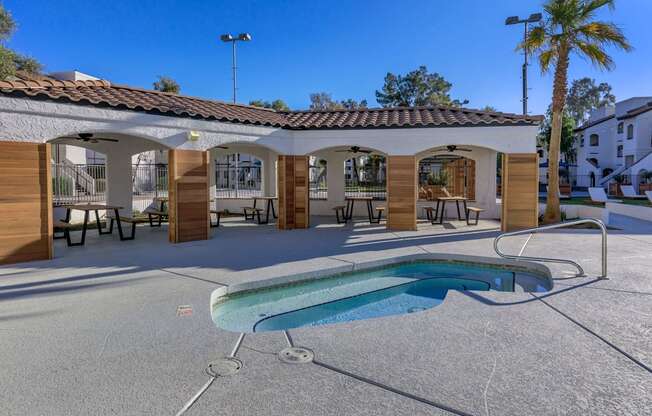 a pool and hot tub at the resort at longboat key club