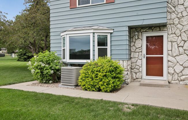 Townhome-Style Living with Greenbelt Views, Attached Garage & Community Pool!