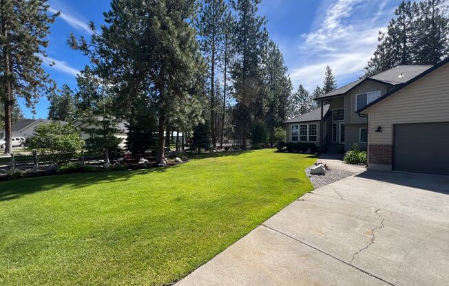 Suncrest Rental with large manicured lawn
