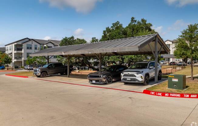A parking lot with a sign that says "Free Lane No Parking Ton Away".