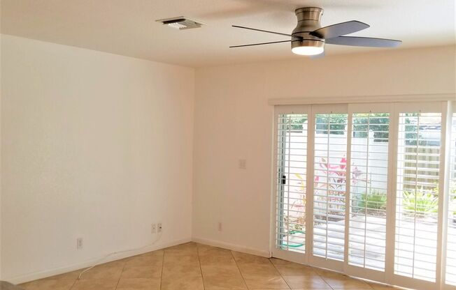 Beautifully maintained 2-bedroom, 2.5-bath townhome with a private fenced backyard and patio