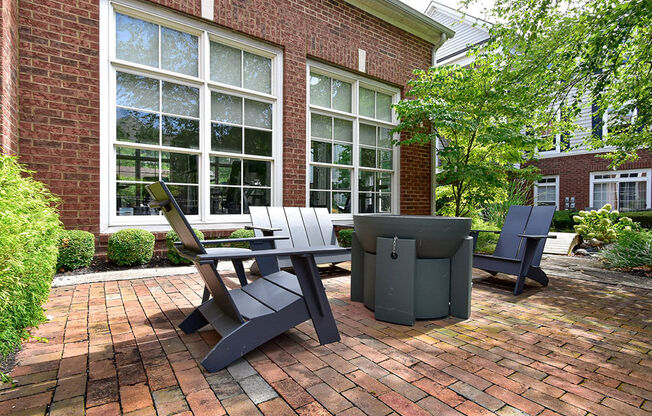Outdoor lounge area with fire pit at Central Park Apartments in Worthington, Columbus, OH