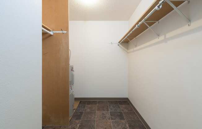 Bismarck, ND Bradbury Apartment. A small laundry room with a washer and dryer
