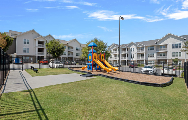 the preserve at ballantyne commons play area with playground and apartments