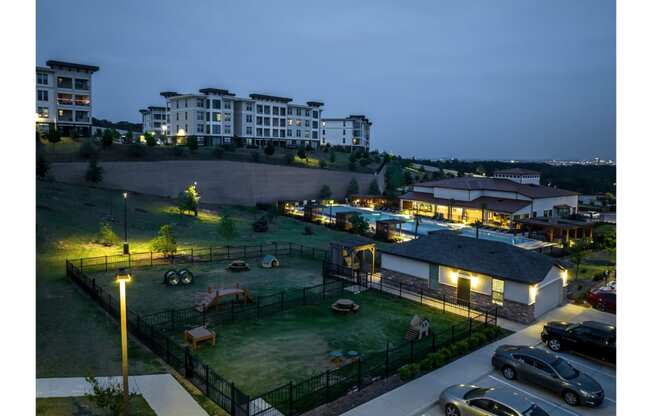 aerial view of the dog park and swimming pool at Reveal Skyline apartments