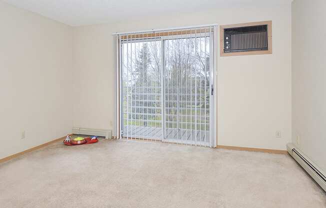 Living Room with Sliding Door to Patio or Balcony