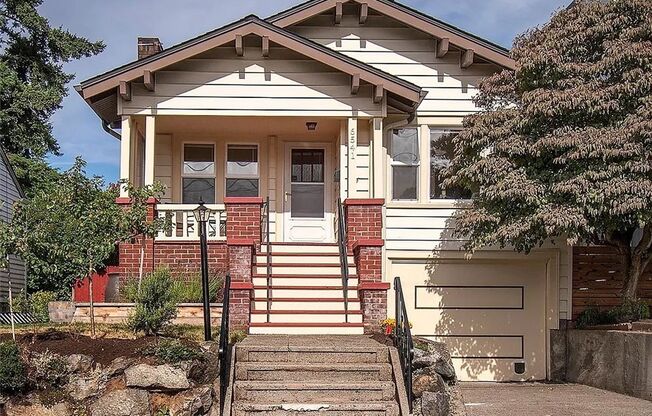 $1000 Off w/ move in by 10/15 - Charming Ballard Home with Modern Upgrades & Classic Front Porch + Garage