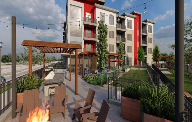 a rendering of an apartment complex with a fire pit
