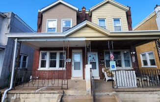 1st MONTH FREE*! Twin home with stainless appliances, washer & dryer in basement, central A/C, pets ok*!