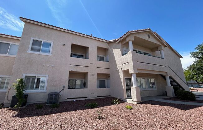 BEAUTIFULLY MAINTAINED 2 BEDROOM, 2 BATH CONDO WITH ATTACHED 2-CAR GARAGE IN A HIGHLY DESIRABLE GATED COMMUNITY!