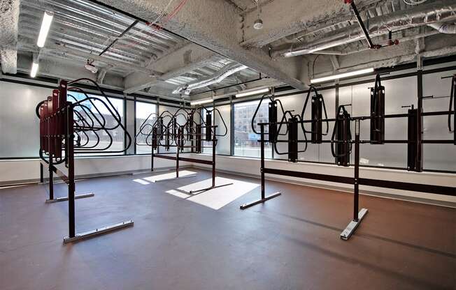 a room full of exercise equipment in a building