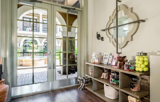 Pet-friendly amenity station offering treats, toys, and essentials for residents’ furry friends.