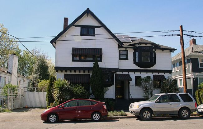CHARMING 3 BEDROOM TUDOR REVIVAL APARTMENT W/ PUGET SOUND VIEWS