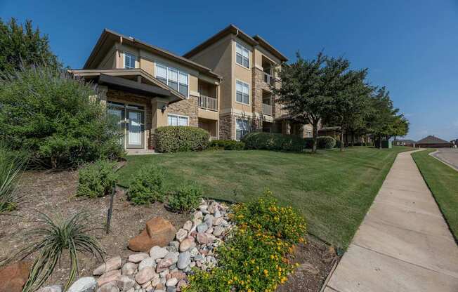 Exterior of apartment complex at Woodbridge Villas Apartments, Sachse, 75048