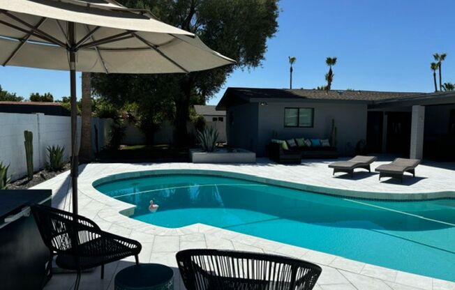 Amazing remodeled home in the Sands Scottsdale!!!  4 bedroom with a den remodeled yard and so much more!!!  Available June 1st!!  Gourmet kitchen with Huge island and all appliances!!!  This is a Stunner!!!