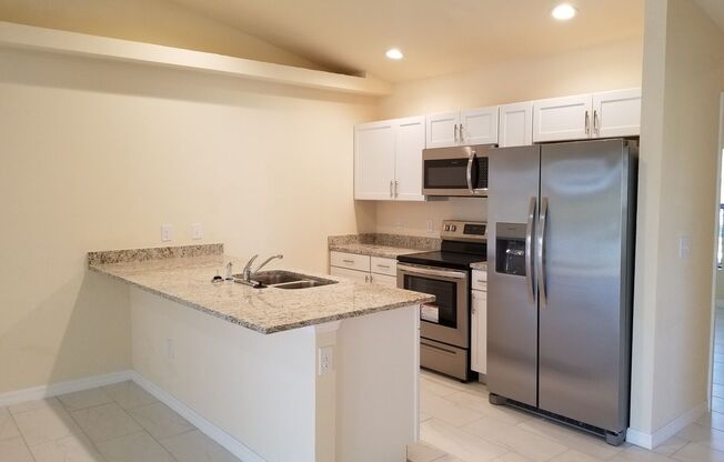 3 Bedroom 2 Bath 1 Car Garage Waterfront Duplex in Cape Coral!