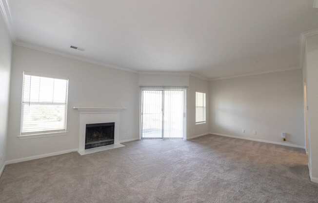 Living room with fireplace at Center Point Apartments, Indianapolis