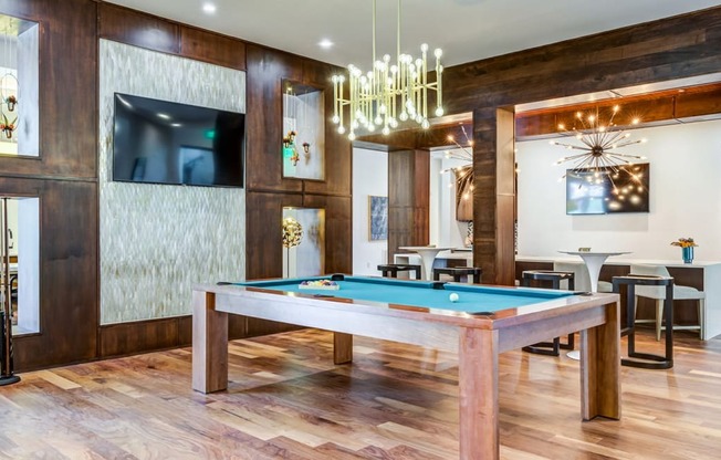 Social lounge with billiards at Berkshire Ballantyne apartments