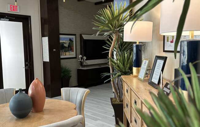 a dining room with a table and chairs