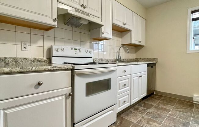 Don't Miss Out! Amazing Sunnyside Location~ Upstairs Unit, Updated Throughout~ 90 Walk Score, 98 Bike Score~ Off Street parking~ Free Laundry!