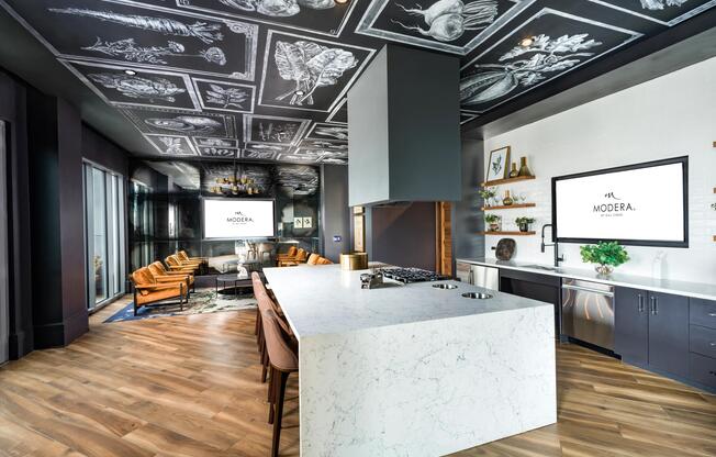 Enter the demonstration kitchen at Modera Old Ivy, where statement finishes, open seating, and curated design create a social hub in Atlanta.
