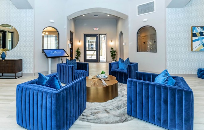 blue sofa decorat The Paseo by Picerne, Goodyear, 85395