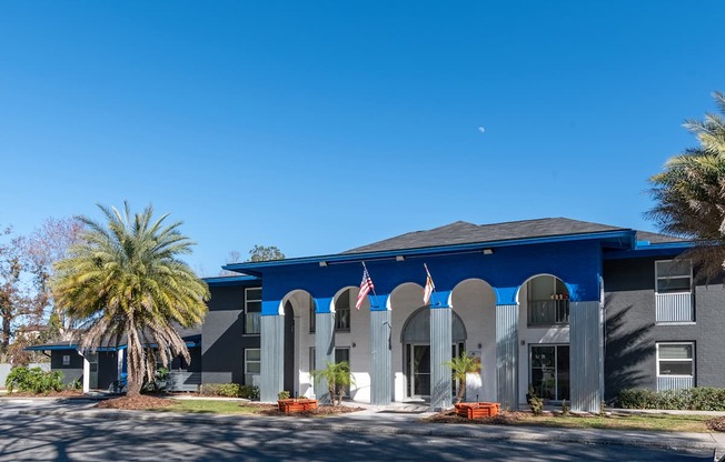 Mandarin Bay exterior with a blue roof and a flag on it.