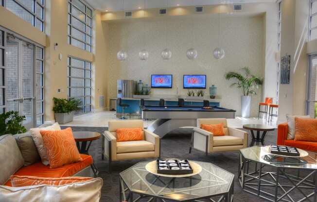 Resident lounge and kitchen with flat screen tvs