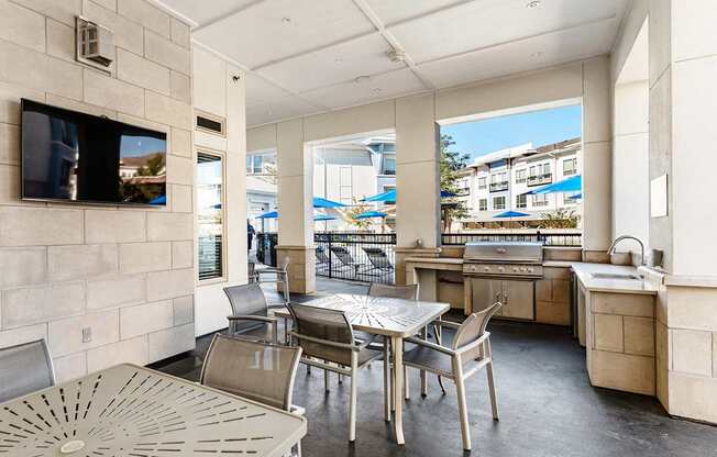 Covered BBQ station with ample seating - Everlee