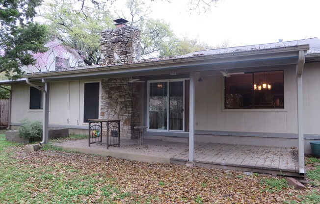 Established one story 3/2/2 on tree covered lot!