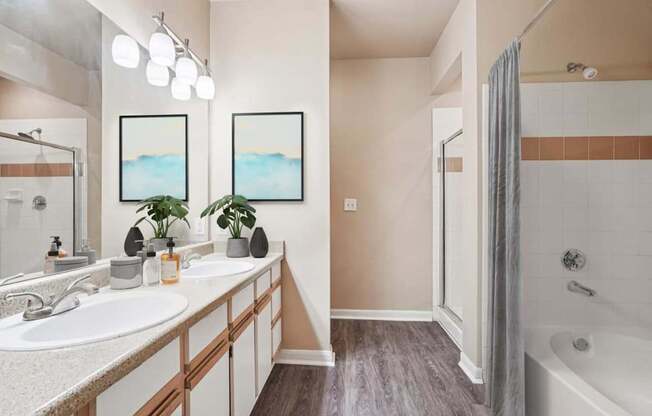 A bathroom with a white sink and a large mirror at Reserve at Canyon Creek,Texas,78230