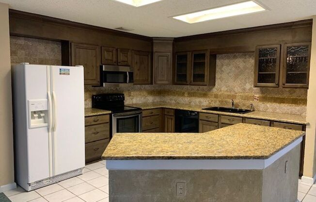Charming 3-bedroom home in the coveted Parkwood Subdivision offers modern amenities