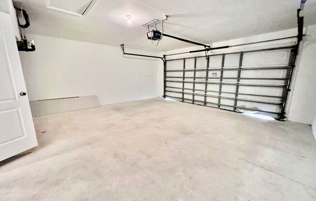 Charming 3BR Home with 2-Car Garage & Lawn Care Included in Lehigh Acres!