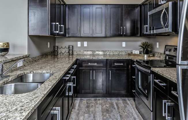 Dark cabinets at The Apartments at Lux 96 in Papillion, NE