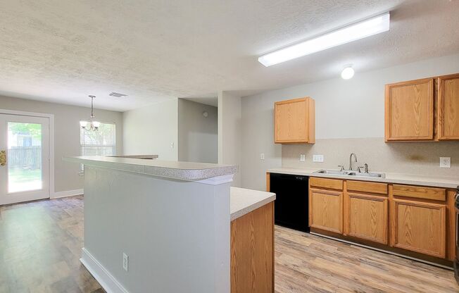 Lovely 3/2/2 home in quiet Newport subdivision of Crosby. Large open concept home with formal dining room that can be used as a second living space. Large bedrooms, master has separate sitting area. Big backyard with over-sized back deck.  Beautiful Vinyl