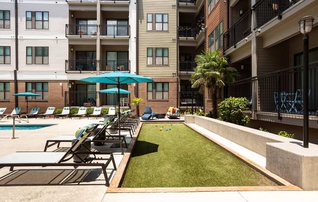 our apartments have a large pool and lounge chairs