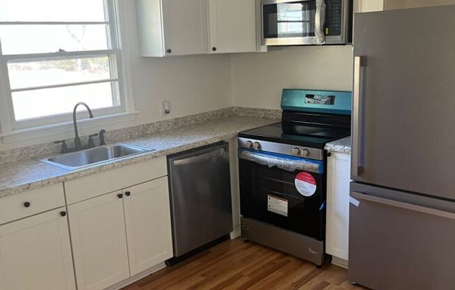 Charming Newly Renovated Duplex in Belmont – Available Now!