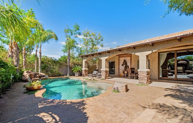 Retreat to a Private Oasis with Resort-Style Pool in an Old World Setting
