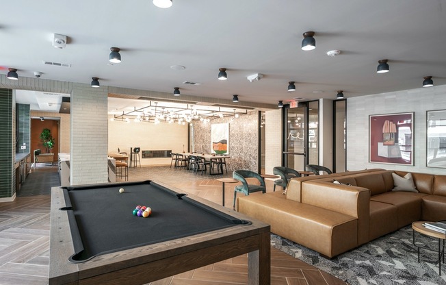 Discover ultimate leisure and entertainment at Modera EaDo's expansive clubhouse, boasting versatile gathering spaces, and dynamic gaming areas for endless enjoyment.