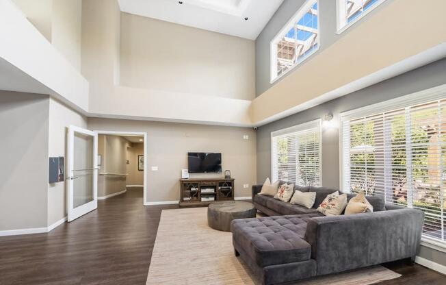 a living room with a couch and a tv