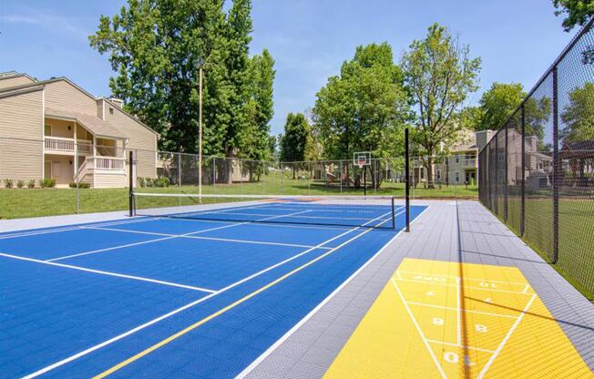 basketball court at the whispering winds apartments in pearland, tx at Hunters Chase Apartments, Virginia,23112