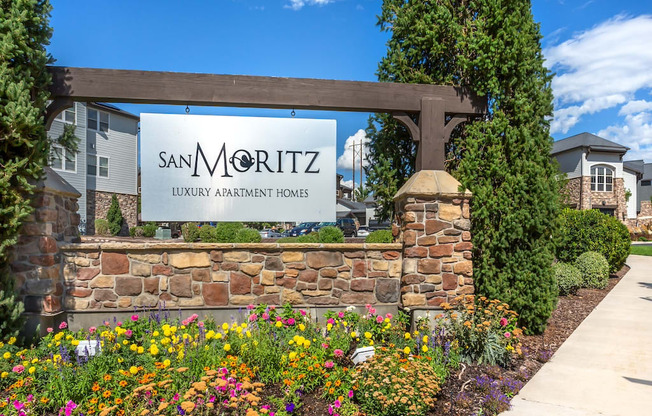 San Moritz Sign with Flowers