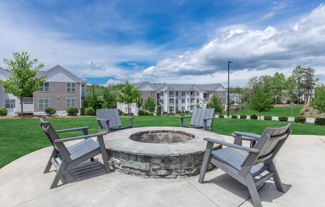 a couple of lawn chairs sitting on top of a picnic table